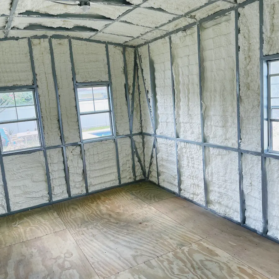 Closed-cell spray foam insulation applied to wall cavities in a residential project in Glenvar Heights